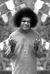 Swami, facing, with both hands out