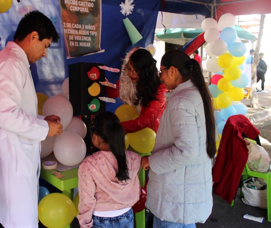 Bolivia Educational Fair Sucre Doctor and Family 01
